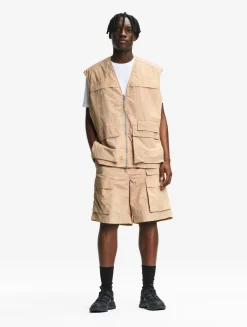Le gilet de pêcheur mixte Aigle Experience by Études - Beige