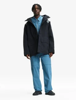 Le manteau mixte technique GORE-TEX® Aigle Experience by Études - Noir