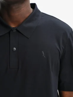 Polo DRY FAST TEXTILE® anti-UV avec logo sur la poitrine - Noir