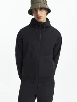 Veste zippée softshell à capuche coupe-vent - Noir